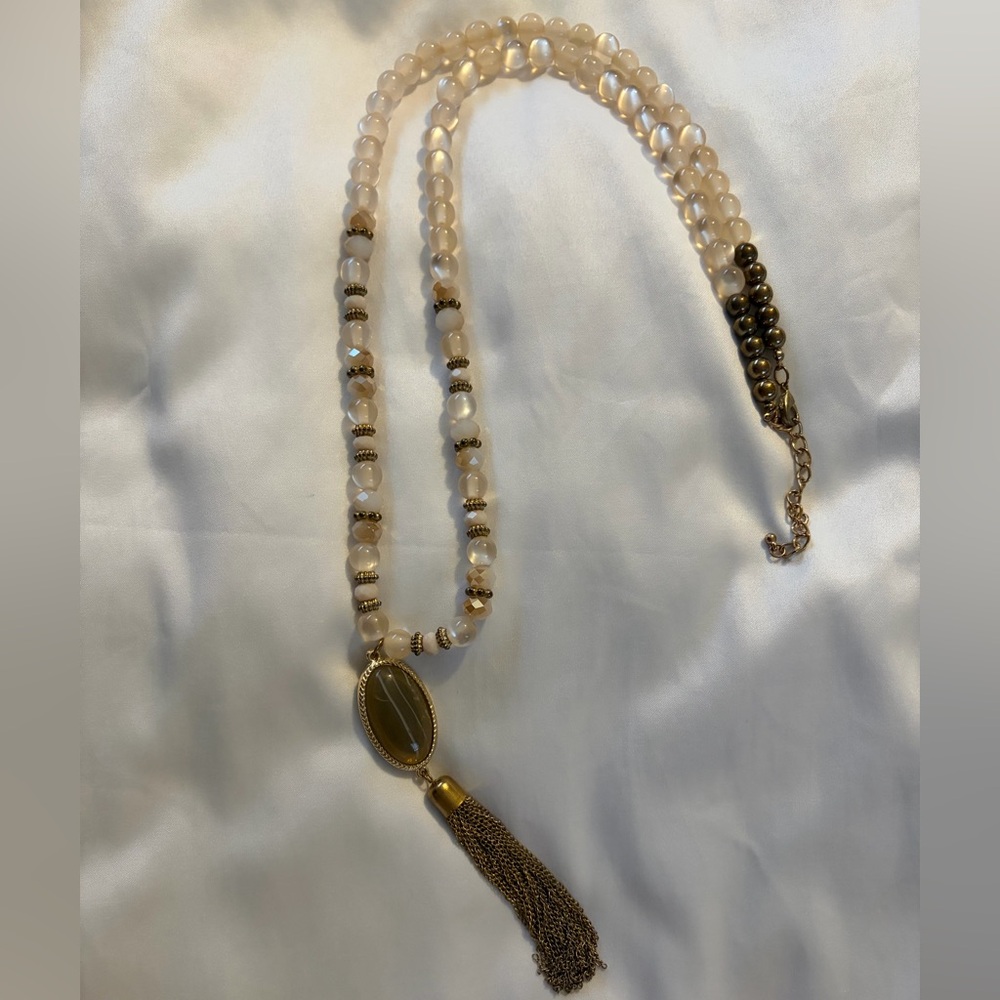 Elegant Beaded Necklace with Gold Accents & a Long Multi Chain Tassel Pendant